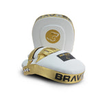 White and gold boxing mitt with 'Brave' branding on a white background
