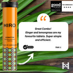 Orange hydration tablet container with a quote and 'Good Food' recommendation on a leafy background