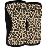 Pair of leopard print knee sleeves with black accents on a white background